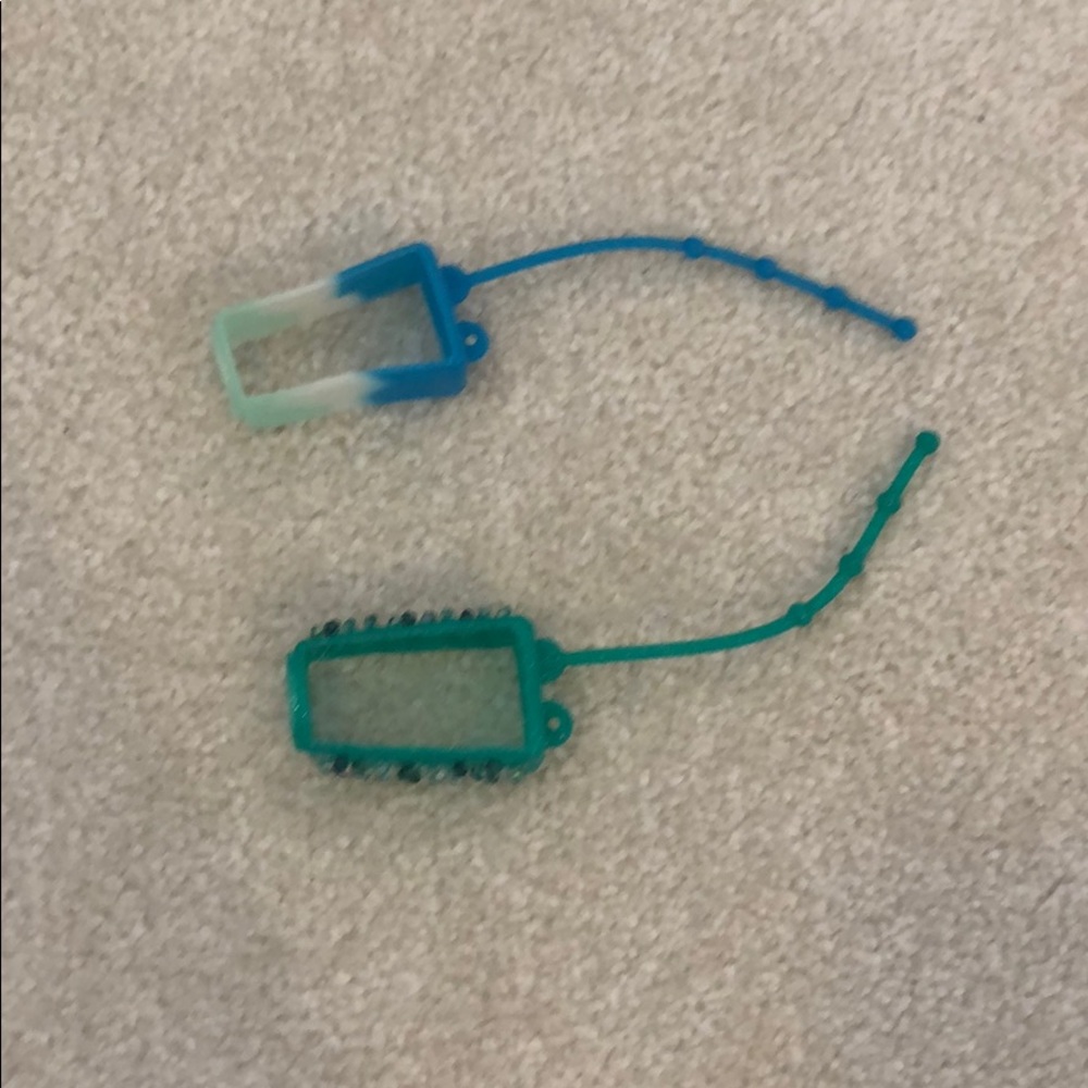 2 hand sanitizer holders